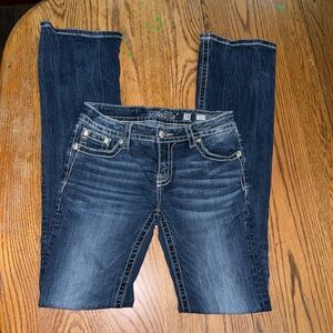Size 28 Miss Me jeans worn once, black angel wing back pockets